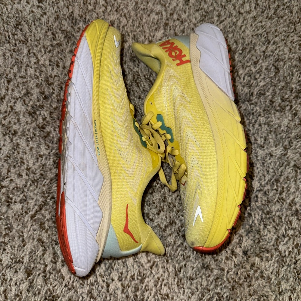Hoka Yellow Running Shoes with Red Accents